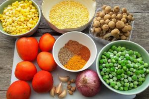 ingredients for tomato and split mung bean daal
